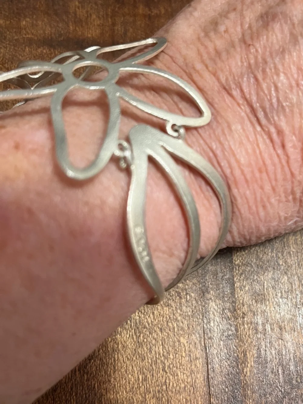 Tous Silver Floral Cutout Cuff Bracelet with Pink Accent